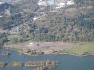 Aerial photo of land and river bank and river