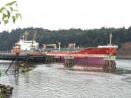 Ship at dock, river