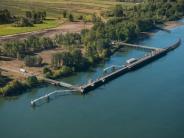 Shipping dock along the river, trees